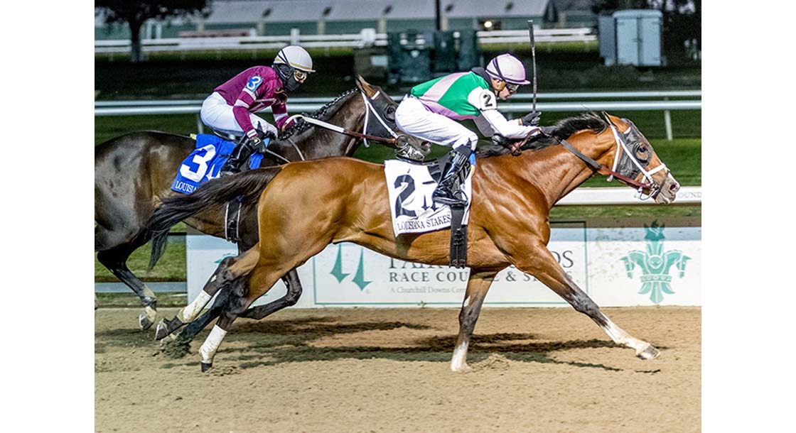 1/22/2022 - Mandaloun with Florent Geroux aboard outruns Midnight Bourbon to win the 76th running of the $150,000 Grade III Louisiana Stakes at Fair Grounds. Hodges Photography / Lou Hodges, Jr.