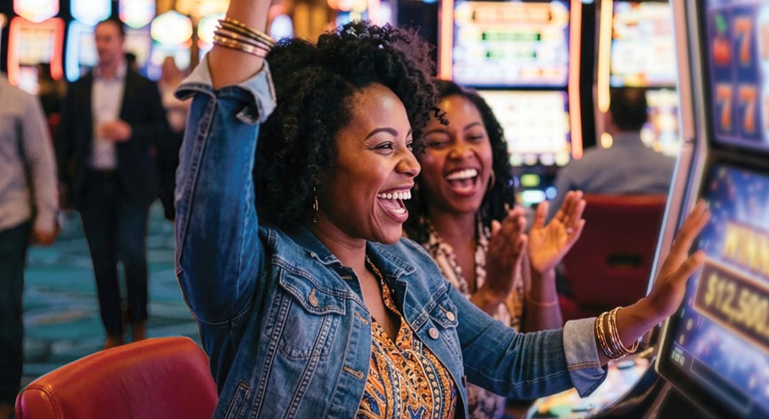 Woman winning money at slot machine